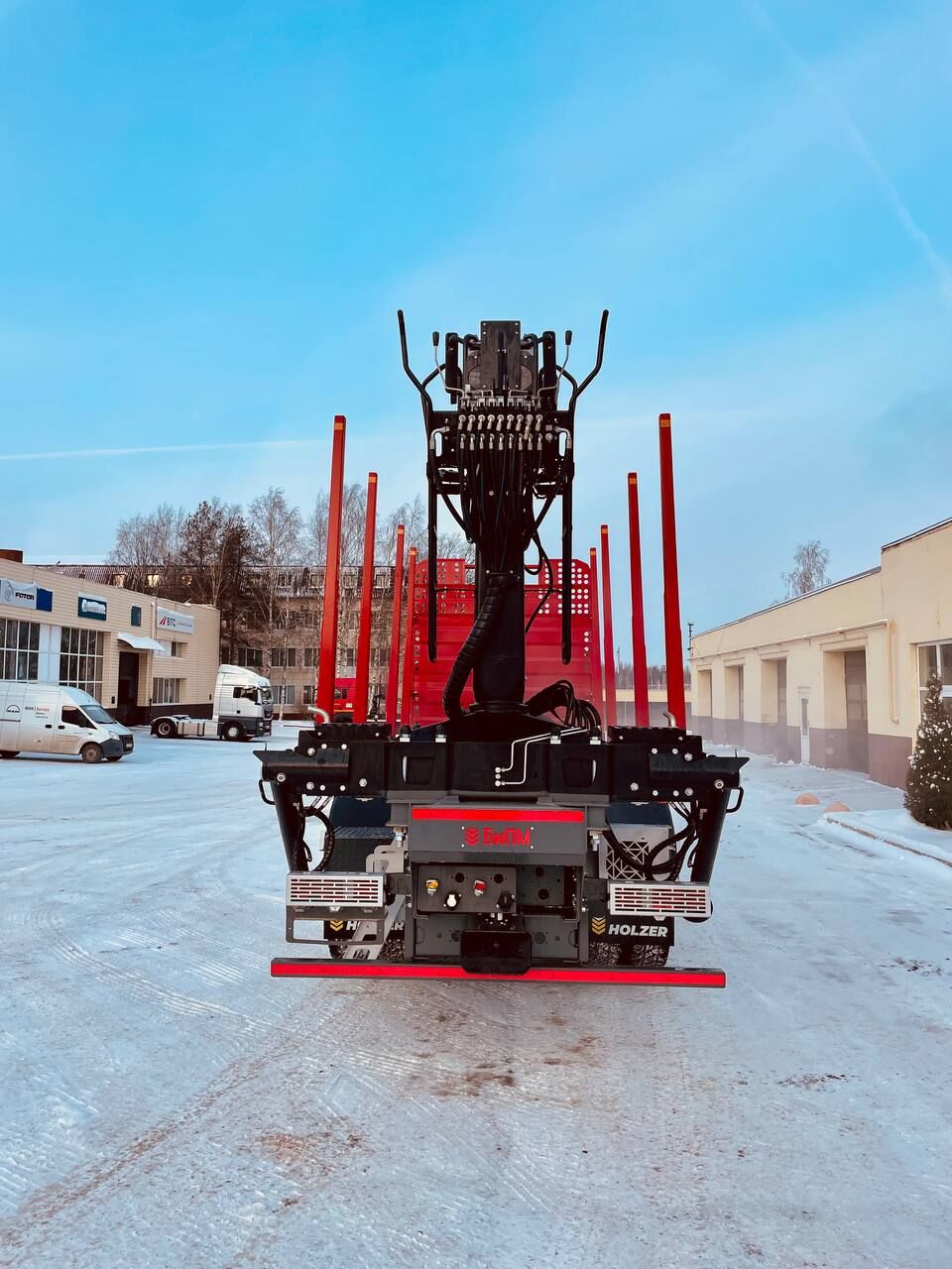 Лесовоз Sitrak C7H 6х4 с КМУ Велмаш ВМ10-86